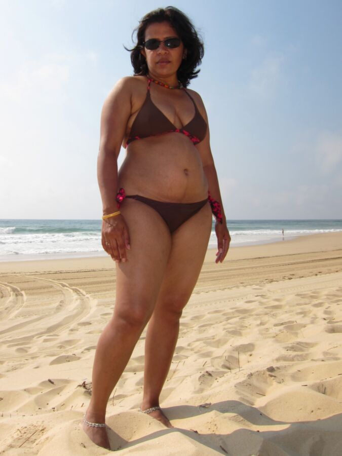 Free porn pics of indian desi milf wife chubby mature bikini beach exposed public  13 of 46 pics