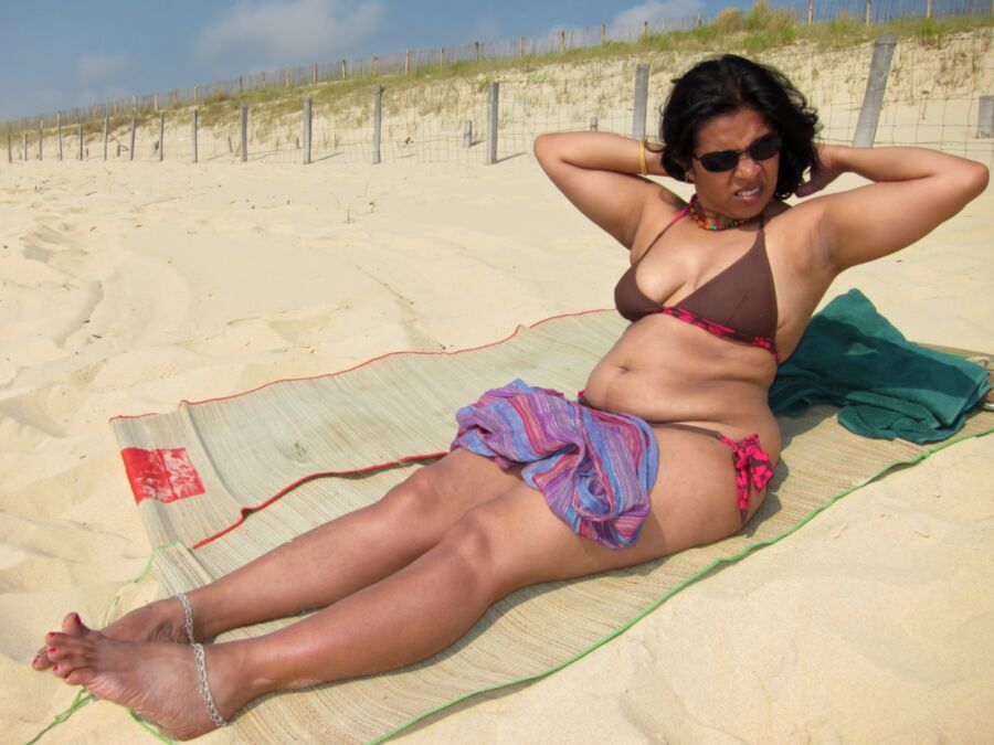 Free porn pics of indian desi milf wife chubby mature bikini beach exposed public  3 of 46 pics