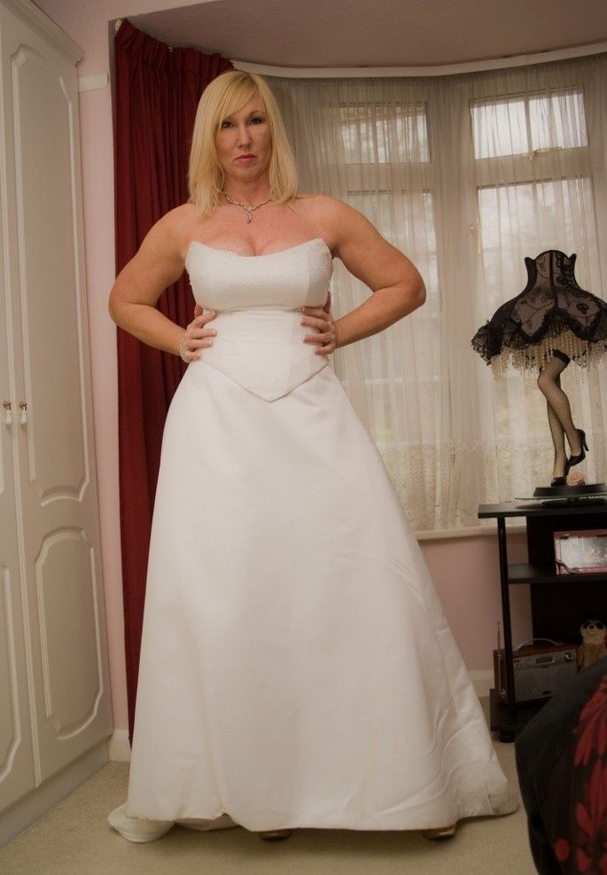 Free porn pics of MILF bride with sexy lingerie teasing before the wedding. 1 of 45 pics