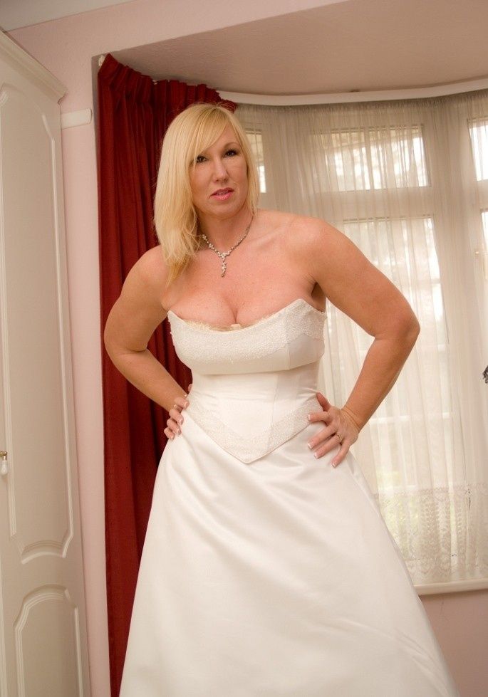 Free porn pics of MILF bride with sexy lingerie teasing before the wedding. 17 of 45 pics