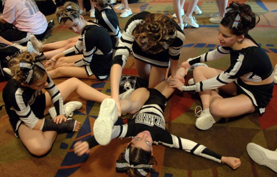 Free porn pics of Cheerleaders stretching 1 of 106 pics
