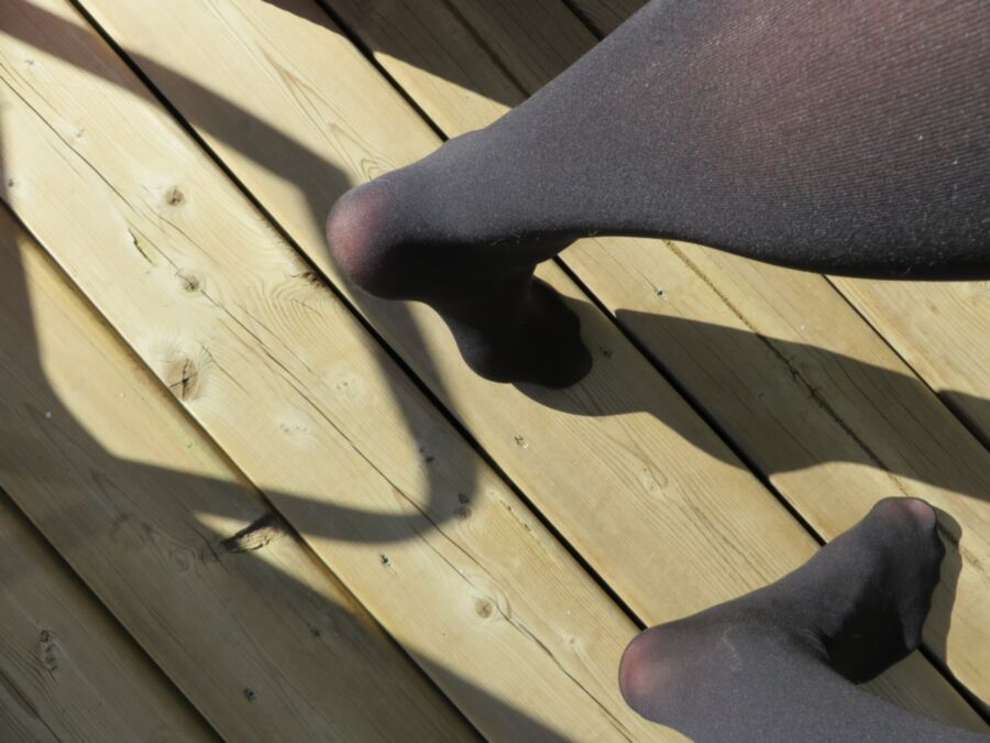 Free porn pics of Black Pantyhose On The Deck 3 of 12 pics