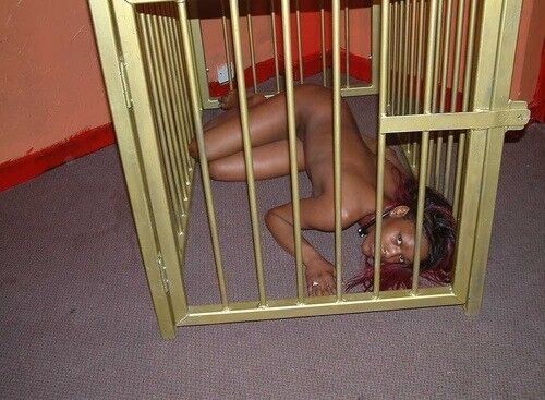 Free porn pics of UK ebony slave Cookie in BDSM 18 of 18 pics