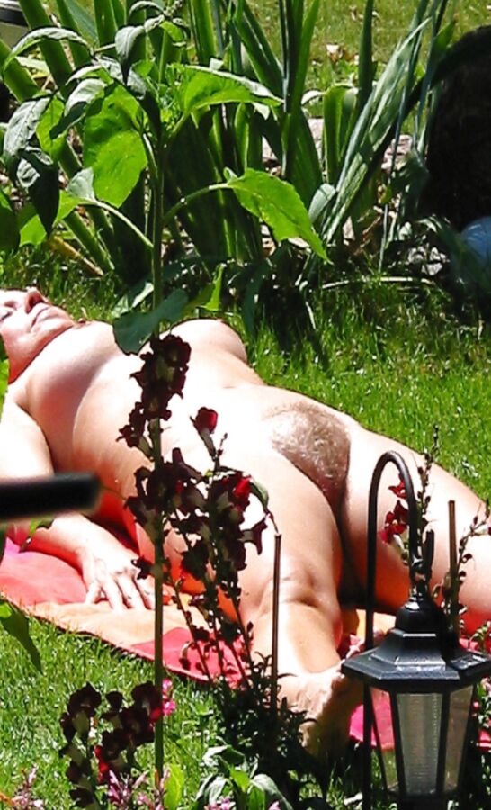Free porn pics of Naked sunbathing wife accosted in garden 3 of 18 pics