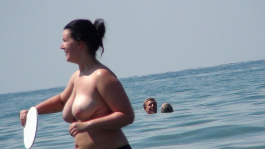 Free porn pics of Topless in sea 1 of 11 pics