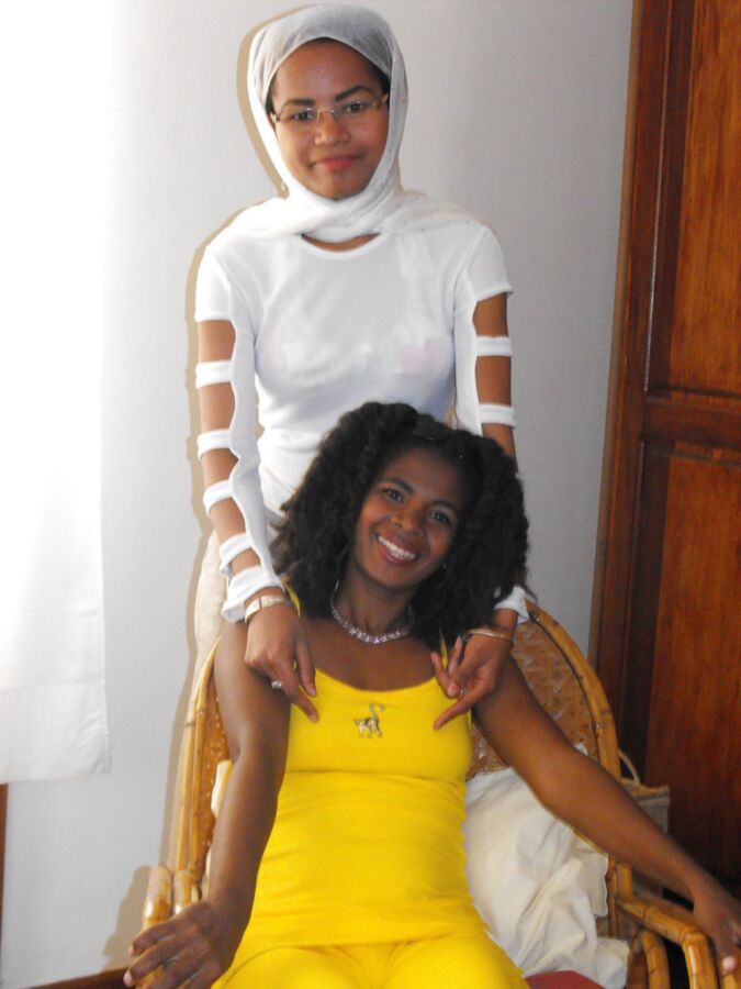 Two Ebony College Girls Teasing and Stripping 2 of 40 pics