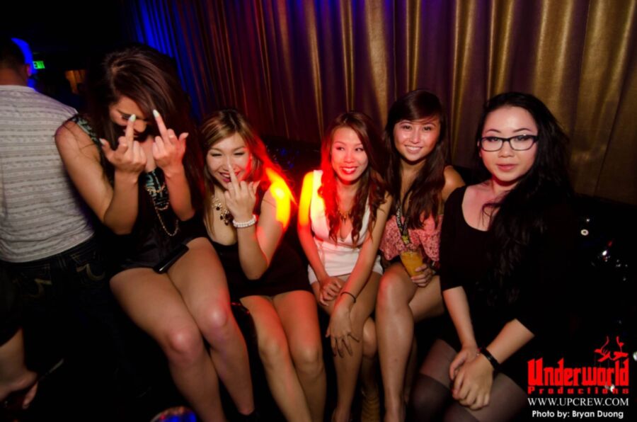 Asian clubbing upskirt. Almost nip slip. 4 of 11 pics