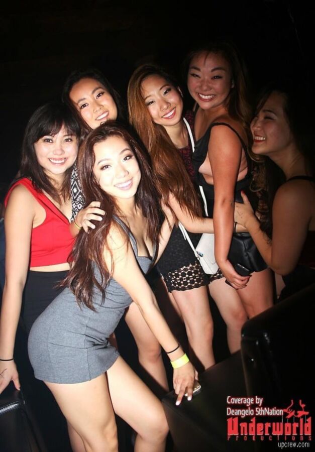 Free porn pics of Asian clubbing upskirt. Almost nip slip. 10 of 11 pics