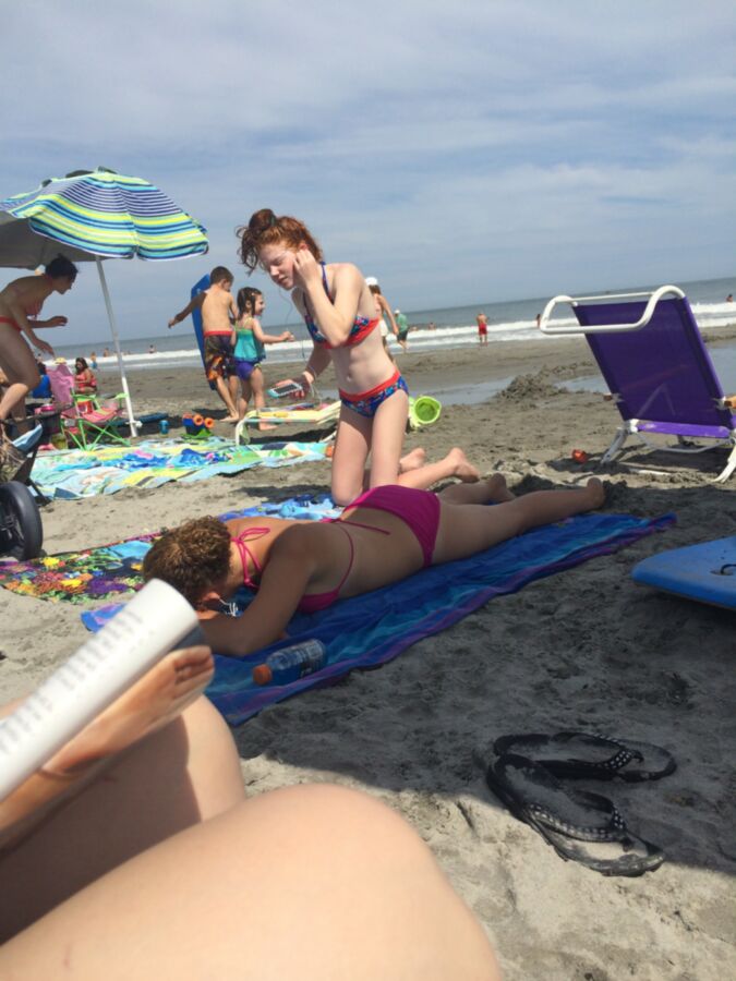 Free porn pics of teen redhead slut on the beach 12 of 14 pics