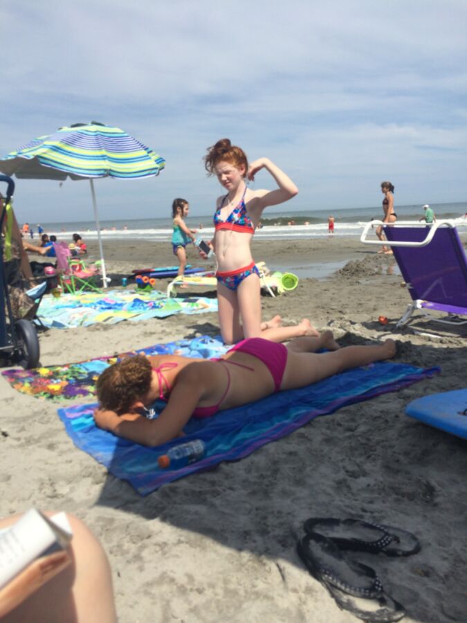 Free porn pics of teen redhead slut on the beach 11 of 14 pics