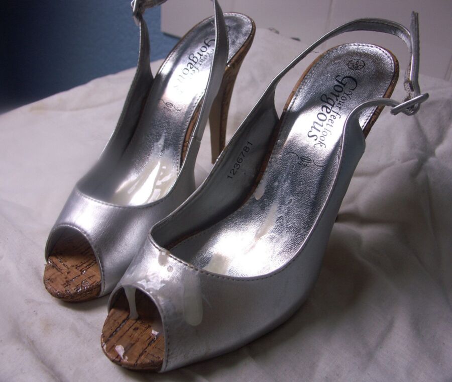 Free porn pics of new silver heels shoefuck 20 of 23 pics