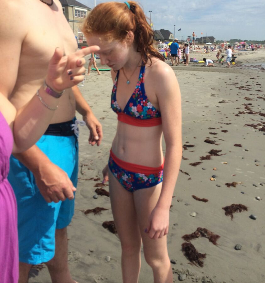 Free porn pics of teen redhead slut on the beach 14 of 14 pics