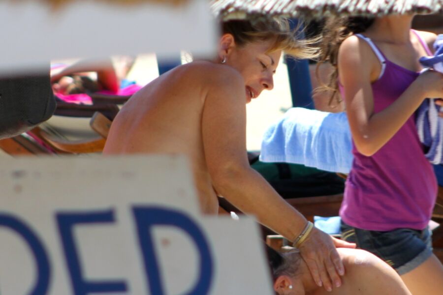 Free porn pics of Mature caught topless in Platys Gialos beach, Mykonos 2 of 8 pics